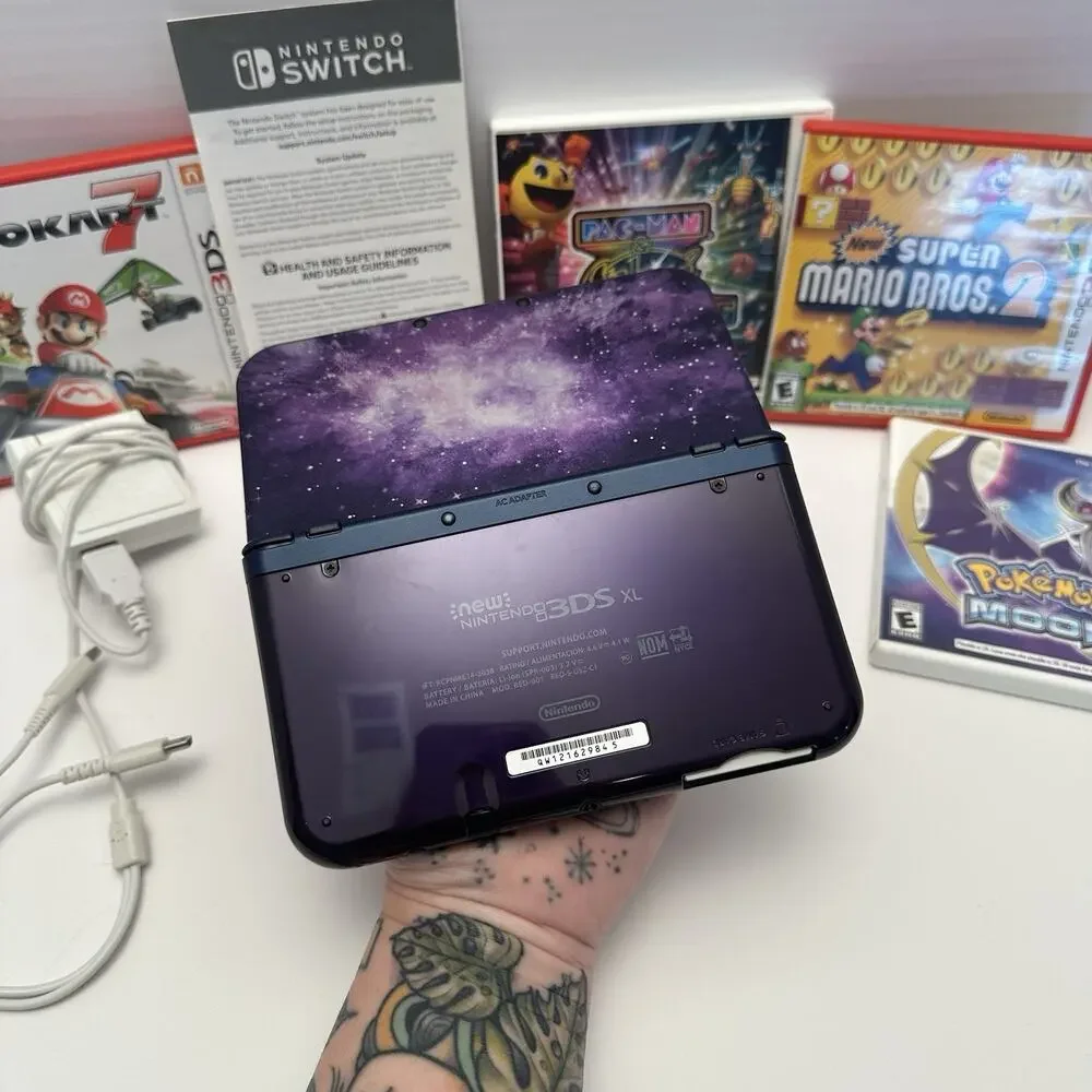 Nintendo New 3DS XL Purple Galaxy Edition - Charger, Stylus, Manual & 4 Games